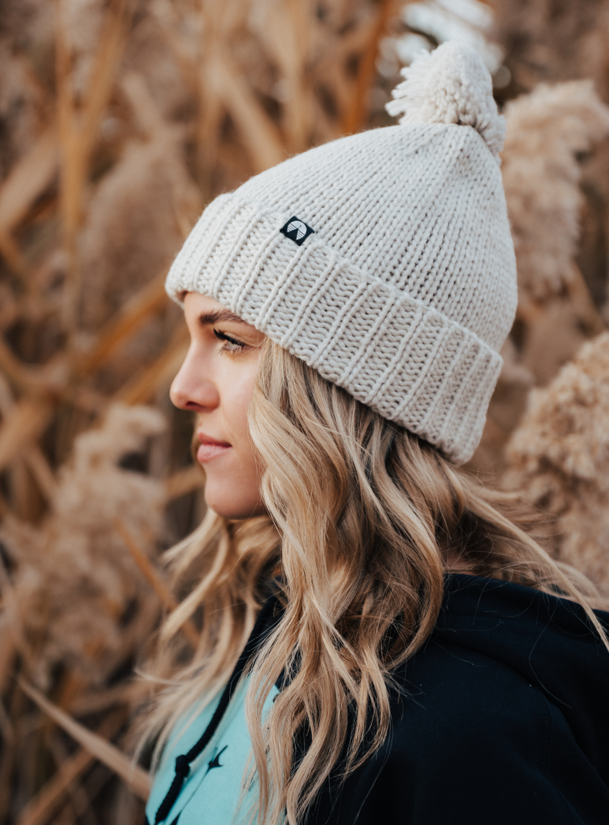 Creamy grey pom beanie